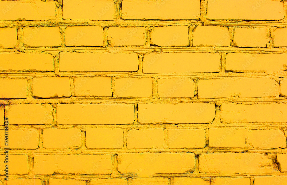 Abstract yellow brick wall texture depicting in paint colors on an old brick wall. . High quality photo Abstract yellow brick wall texture depicting in paint colors on an old brick wall. . High quality photo
