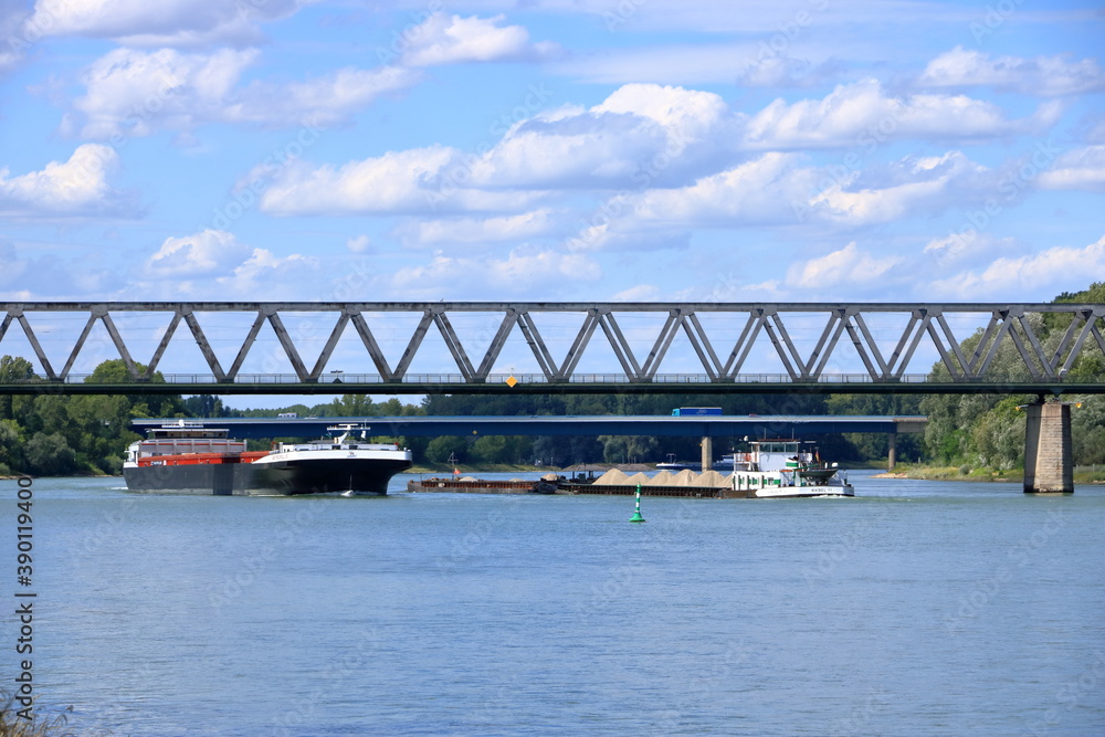 Inland shipping transport on the rhine river near germersheim Inland shipping transport on the rhine river near germersheim
