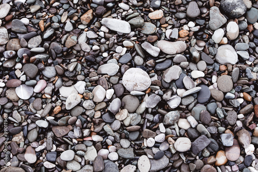 Naklejka premium Sea wet stones on the coast