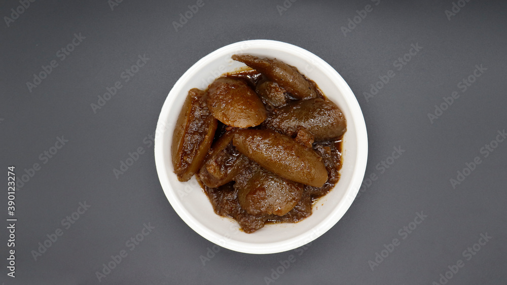 Indian tasty Lemon Pickle also known as Nimbu ka Achar, selective focus Indian tasty Lemon Pickle also known as Nimbu ka Achar, selective focus