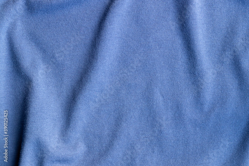 Cotton jersey fabric texture. Crumpled blue textile background