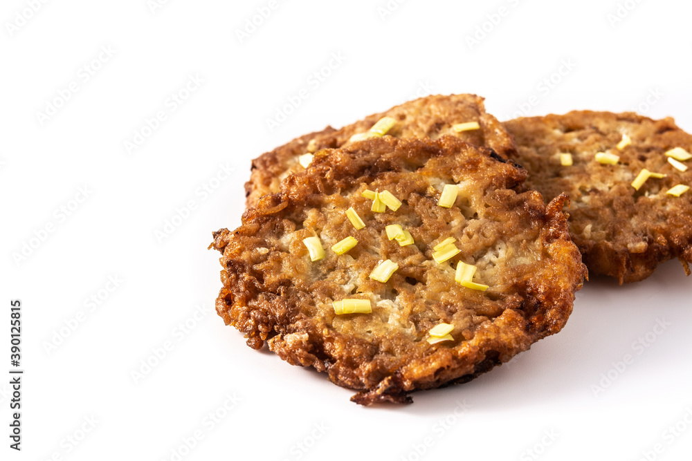 Traditional Jewish latkes or potato pancakes isolated on white background Traditional Jewish latkes or potato pancakes isolated on white background