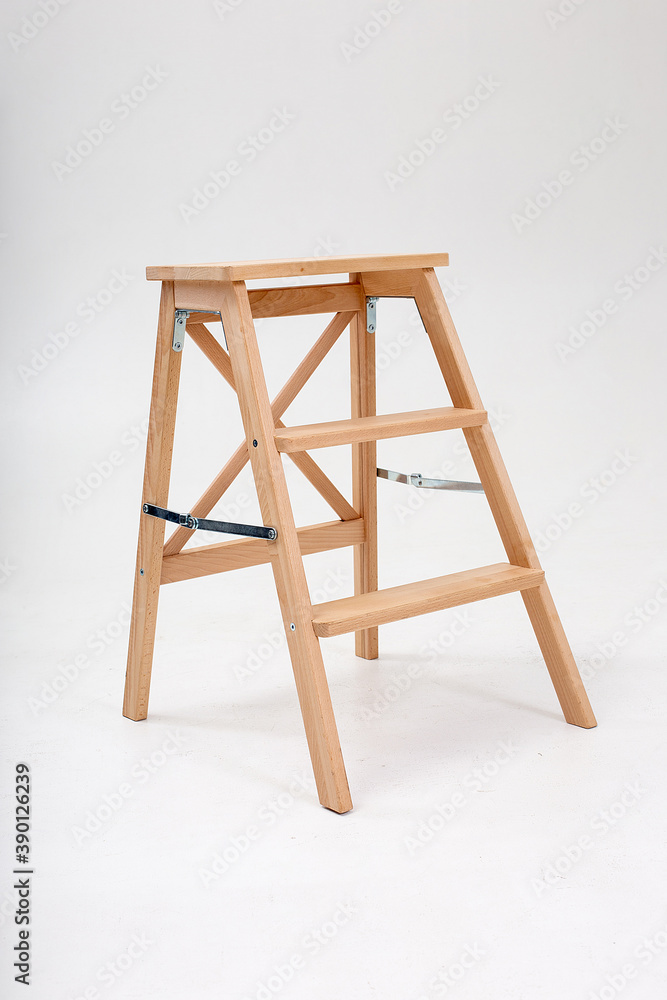 Wooden ladder in emty white room with soft shadow. furniture isolated on studio cyclorama Wooden ladder in emty white room with soft shadow. furniture isolated on studio cyclorama