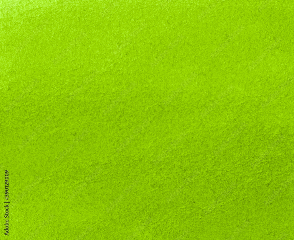 Bright green paper-based watercolor background, hand-drawn with a brush. Bright green paper-based watercolor background, hand-drawn with a brush.