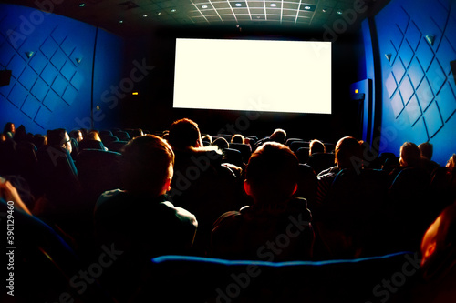 People in the cinema watching a movie.