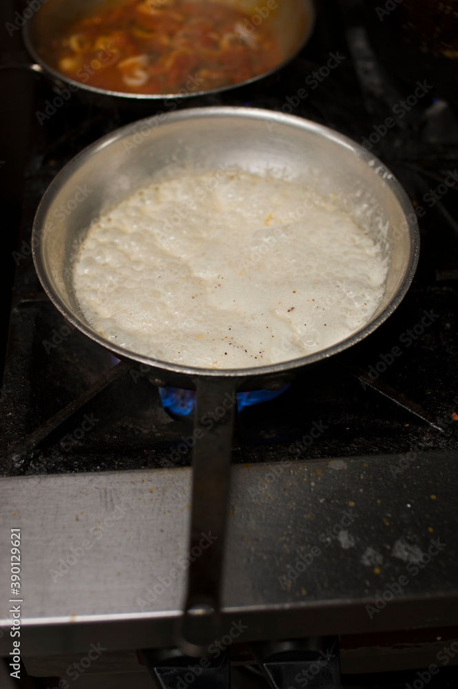 ood preparation in restaurant kitchen. ood preparation in restaurant kitchen.