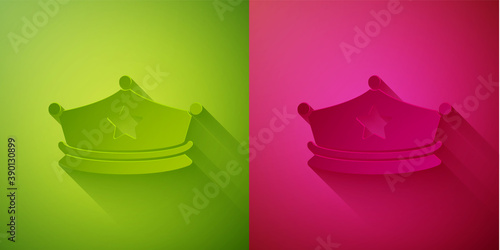 Paper cut Police cap with cockade icon isolated on green and pink background. Police hat sign. Paper art style. Vector.