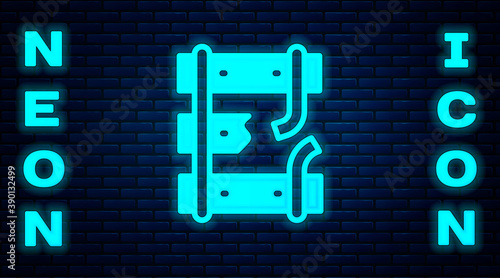 Glowing neon Broken or cracked rails on a railway icon isolated on brick wall background. Vector.