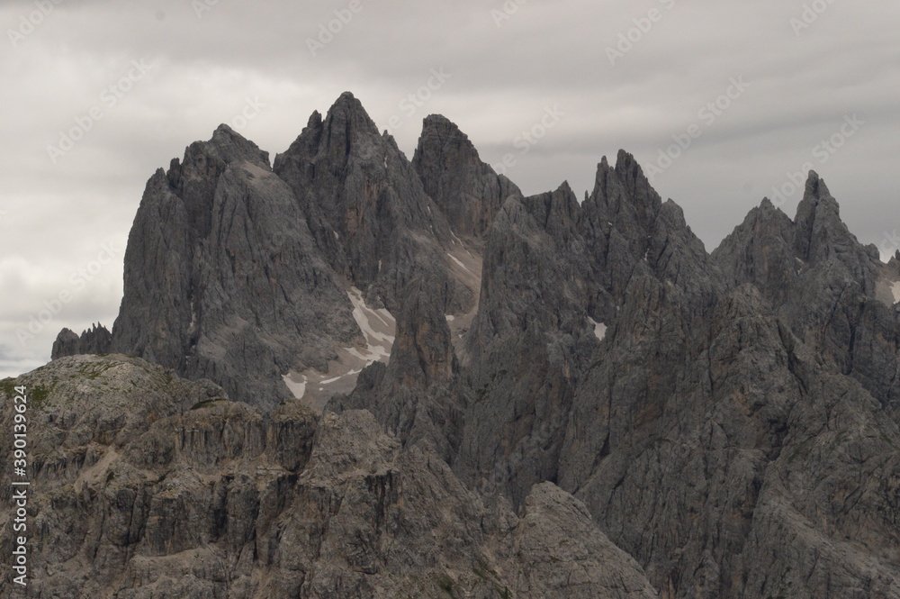 Hiking and climbing at the stunning Passo Giau in the Dolomite mountains of Northern Italy