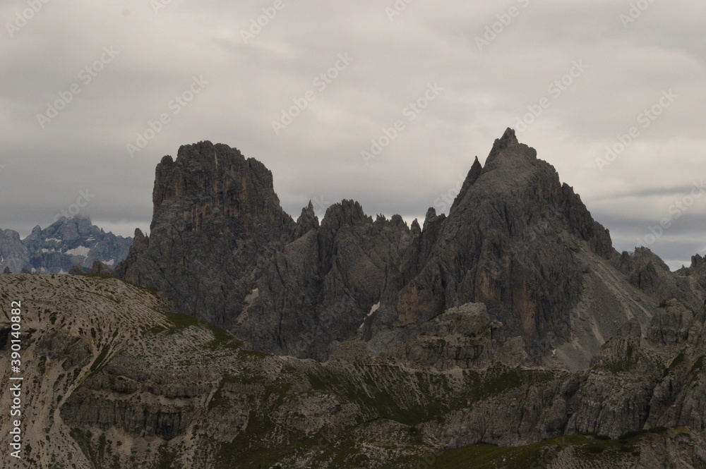 Hiking and climbing at the stunning Passo Giau in the Dolomite mountains of Northern Italy
