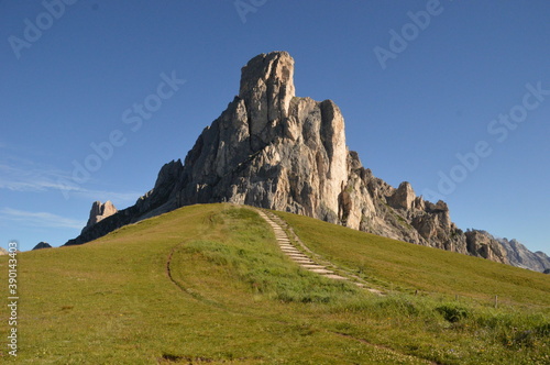 Hiking and climbing at the stunning Passo Giau in the Dolomite mountains of Northern Italy