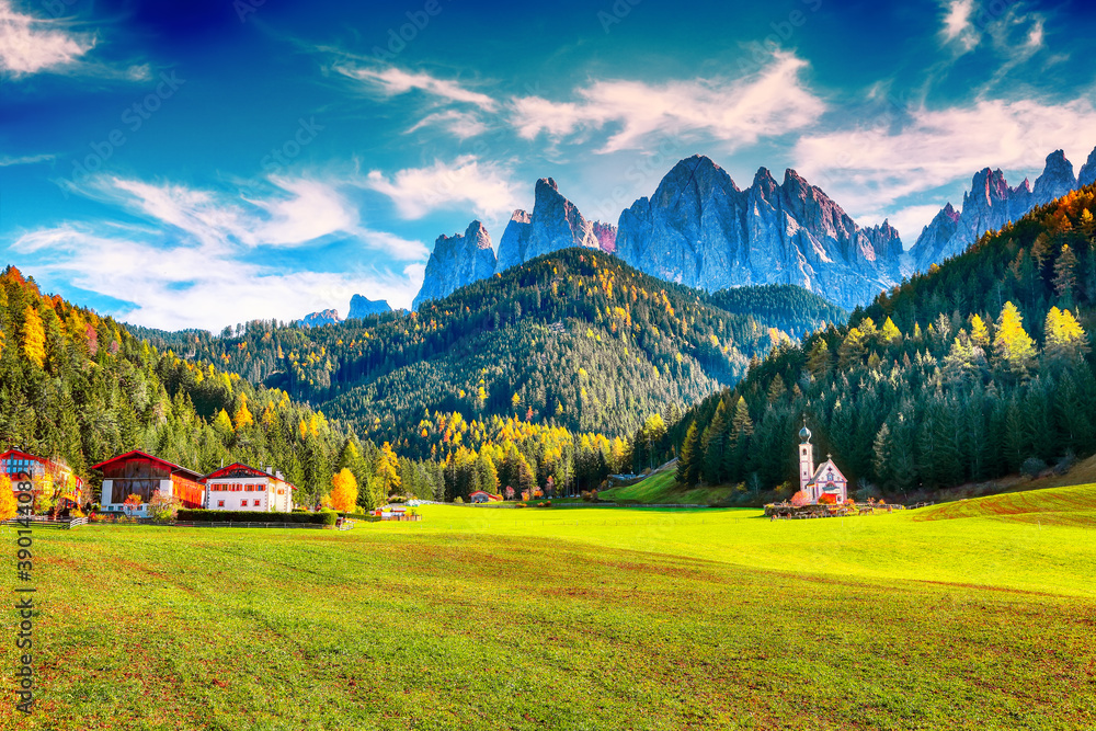 Majestic scenery in Dolomites with the St. John's in Ranui Chapel.
