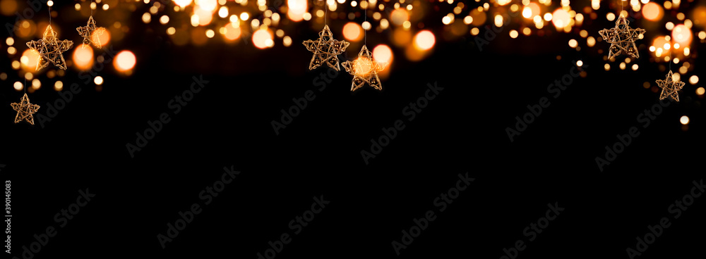 Christmas garland with bokeh
Festive golden christmas garland with glowing bokeh against black background for decorations and space for your text. - obrazy, fototapety, plakaty 