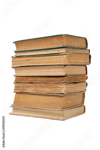 Big stack of old books on white background