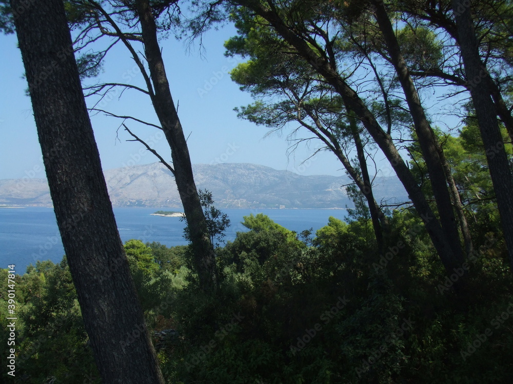 The beautiful Adriatic Sea surrounded by the Dalmatian Mountains, in Korcula, Croatia.