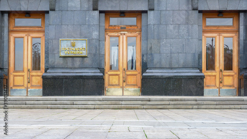 Main entrance to the Administration of President of Ukraine, Doors, Facade and Plate with an Inscription in the Ukrainian - President of Ukraine. Office of the President of Ukraine Building, in Kyiv © Алексей Синельников