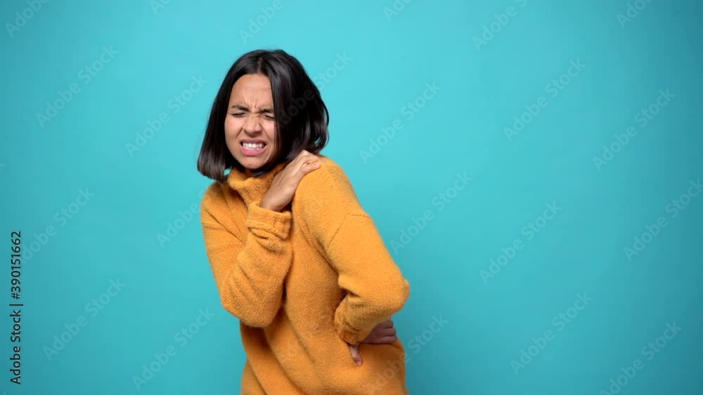 woman suffering from pain in shoulder for having made an effort woman suffering from pain in shoulder for having made an effort