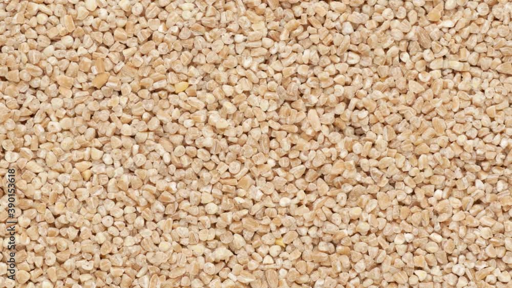Spelled porridge, close-up. Groats - background. Spelta. Spelled porridge, close-up. Groats - background. Spelta.