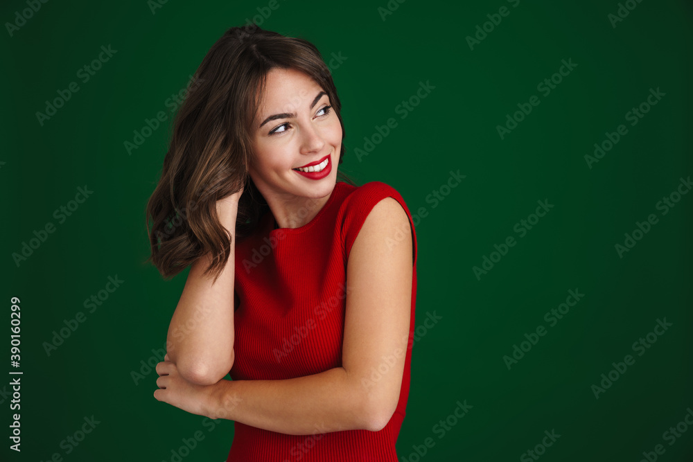 Beautiful happy brunette girl smiling and looking aside Beautiful happy brunette girl smiling and looking aside