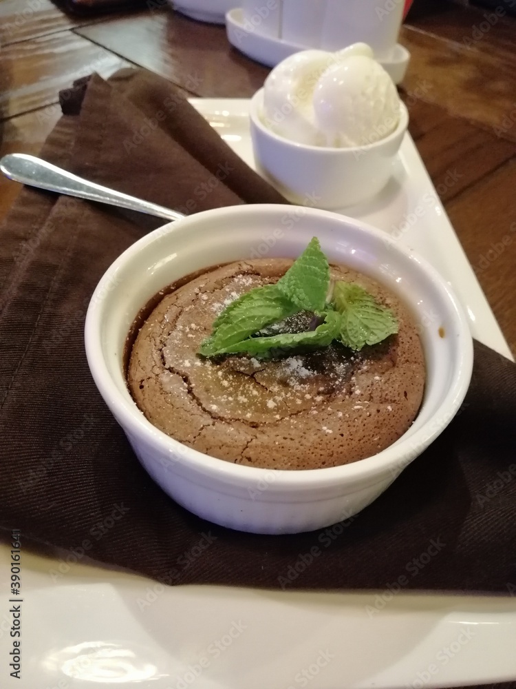 delicious cake and dessert Chocolate Fondue with ice cream and mint leaves delicious cake and dessert Chocolate Fondue with ice cream and mint leaves
