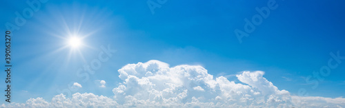 panorama nature blue sky with clouds and sun shines for use banner background