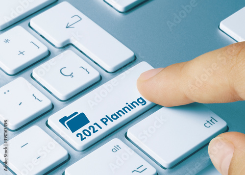 2021 Planning - Inscription on Blue Keyboard Key.