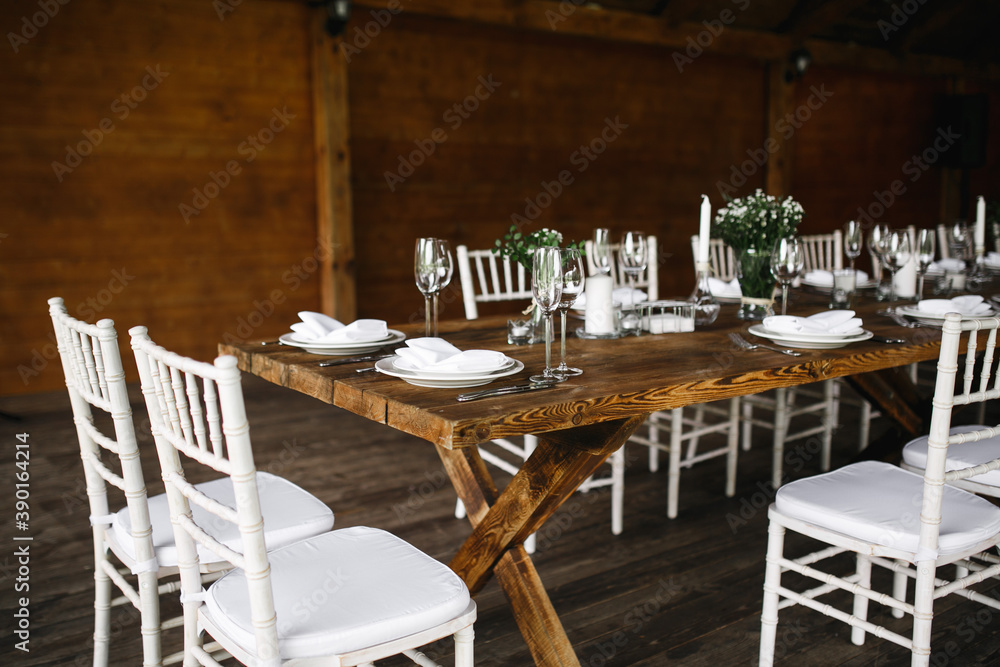 decorated wedding wood table with white chairs decorated wedding wood table with white chairs