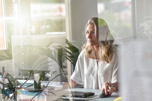 Bussiness woman working at her desk