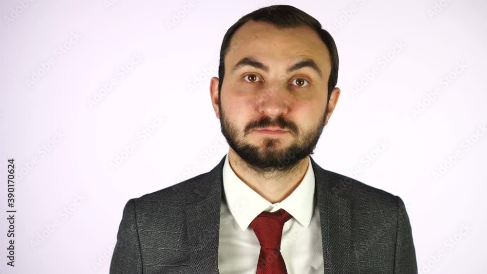 Portrait of serious attractive businessman on white background. Portrait of serious attractive businessman on white background.