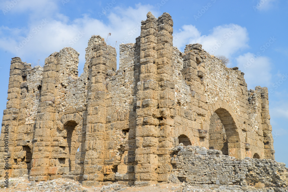 Aspendos was an ancient Greco-Roman city in Antalya. Famous historical landmark of Turkey. Founded in the 5th century BC. Great Basilica. Temple, Cisterns, City Square, Nymphaeum, Agora, Market hall. Aspendos was an ancient Greco-Roman city in Antalya. Famous historical landmark of Turkey. Founded in the 5th century BC. Great Basilica. Temple, Cisterns, City Square, Nymphaeum, Agora, Market hall.
