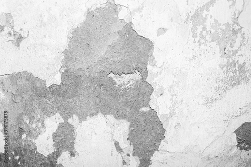 texture of old white wall with fallen off plaster  template for text.
