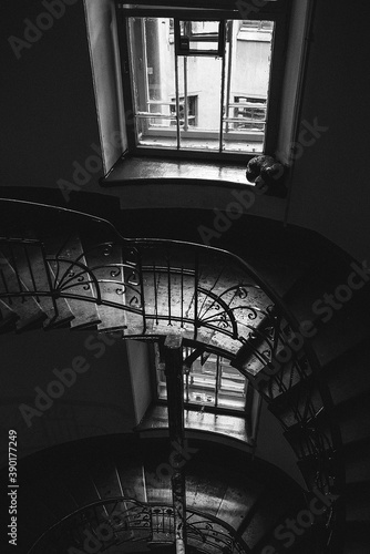 Black and white series of photographs of stairs, windows, doors.