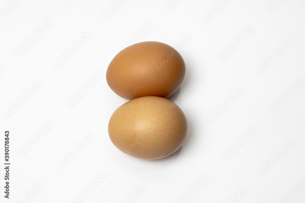 Two chicken eggs isolated on white background Two chicken eggs isolated on white background