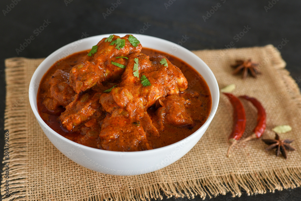 Plakat Spicy red chicken curry. Goan style chicken vindaloo. Butter