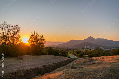 Sunset by the mountains of Santiago (Chile) © Alfonso