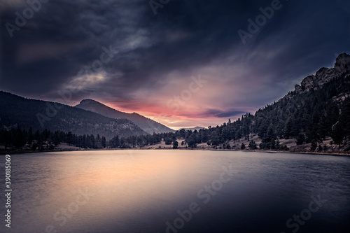 Dramatic sunrise due to smoke from the wildfires over the Lily Lake, Estes Park, Colorado