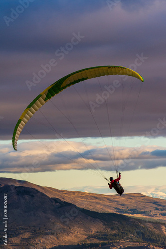 Low angle view of paraglider against sky with clouds in Esquel, Patagonia, Argentina