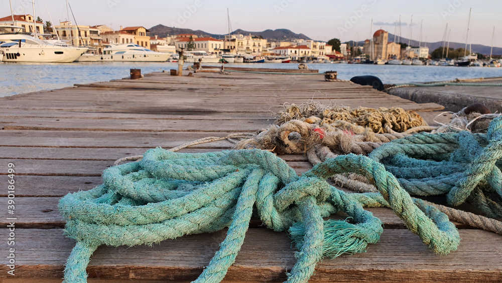 rope sea water boat pier sky ocean village greece