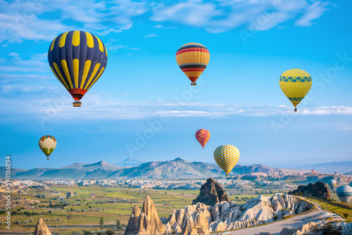 Hot air balloon flying over Cappadocia region, Turkey