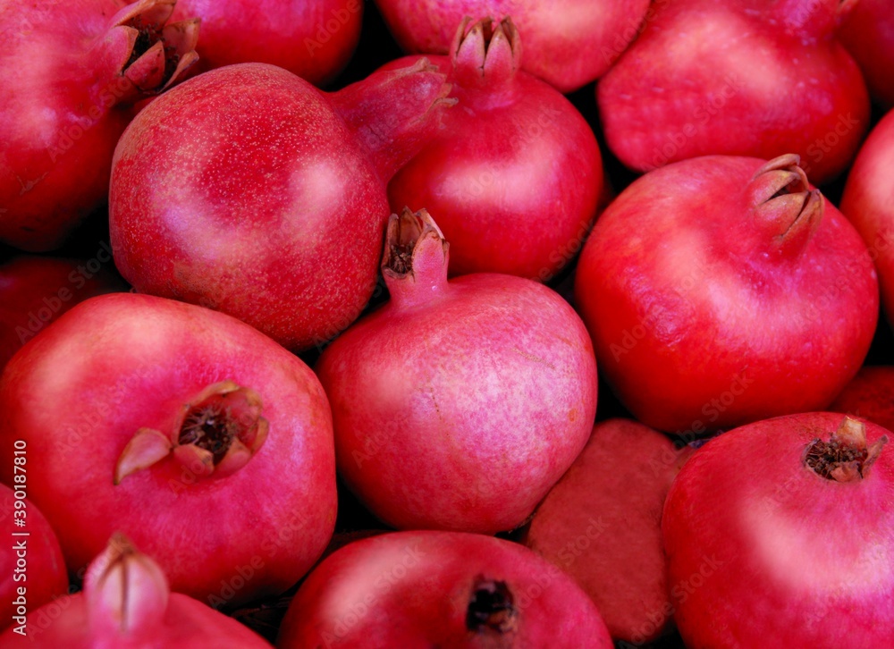 red,juicy and sweet pomegranates close up red,juicy and sweet pomegranates close up