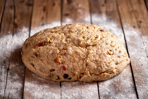 Stollen dough, traditional German Christmas stuffed with raisins and candied fruit