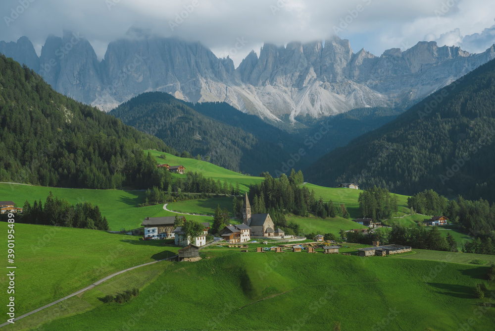 Italy, South Tyrol, Funes, Santa Magdalena, Landscape with village in valley Italy, South Tyrol, Funes, Santa Magdalena, Landscape with village in valley