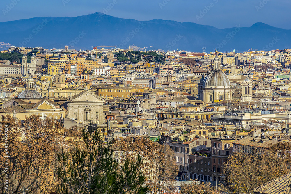 Beautiful panoramic view from above of historical area of Rome at sunset. Rome, Italy.