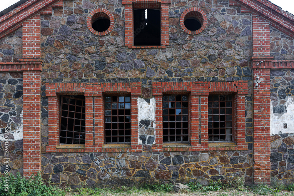 An old abandoned building. Remains of a brick building