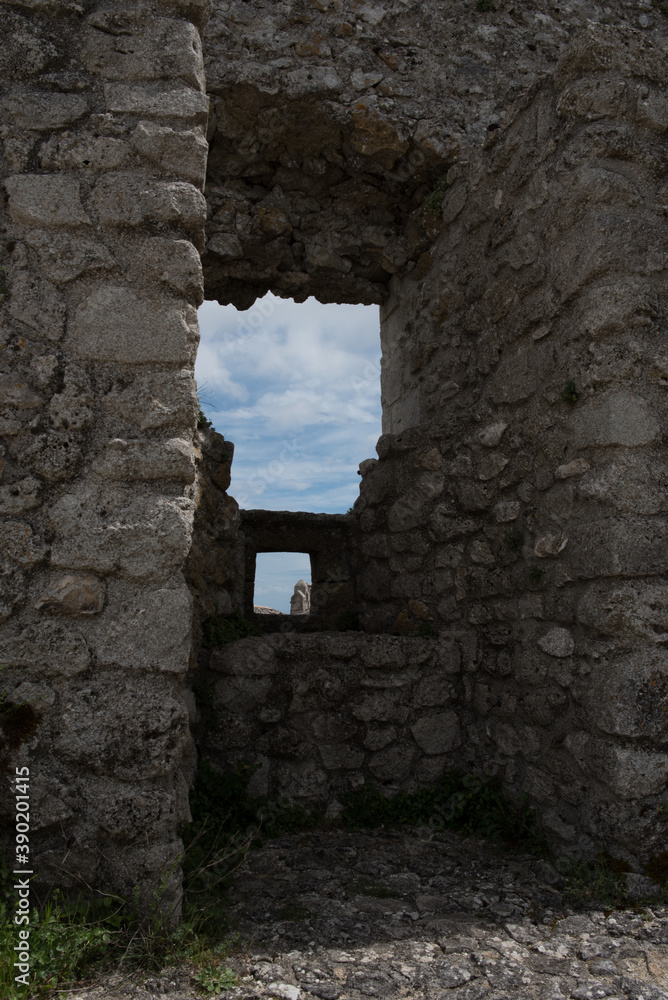 Obraz premium Monte Sant'Angelo, a medieval village in Puglia, on the Gargano peninsula. View of the town, the cathedral and the castle.