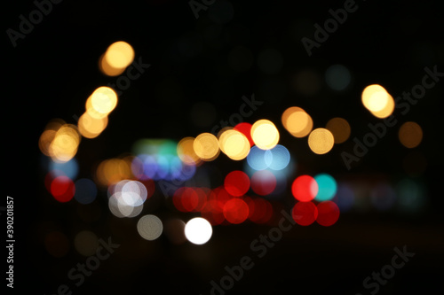 Blur city light of cars headlights on the night city road. Colorful urban abstract background © Oleg