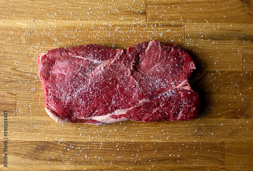 custom made wallpaper toronto digitalClose up of raw meat steak seasoned with kosher salt on wooden table