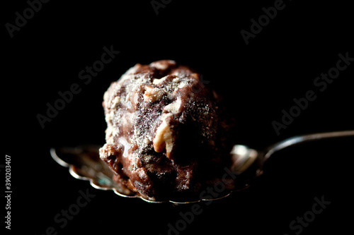 Close up of malted milk ice cream bonbons served in spoon photo