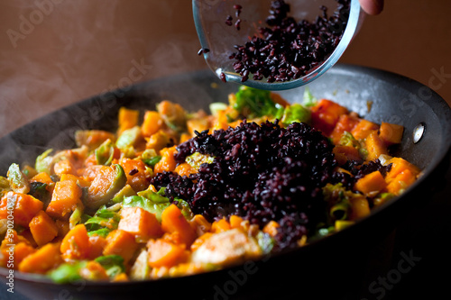Close up of brussels sprouts and roasted winter squash hash in pan