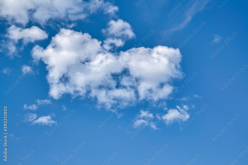 Blue sky with cumulus clouds. Cumulus clouds in the blue sky. Beautiful clouds in the blue sky background. Blue sky with cumulus clouds. Cumulus clouds in the blue sky. Beautiful clouds in the blue sky background.